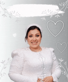 a woman in a white dress is smiling with three hearts behind her