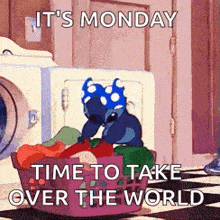 stitch from lilo and stitch is sitting in a laundry basket with clothes .