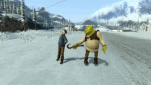 shrek is holding a cane and standing next to a man in the snow