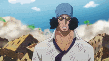 a man wearing a blue hat and sunglasses stands in front of a blue sky