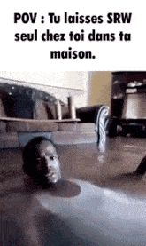a man is laying on the floor in a flooded living room