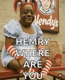 a wendy 's sign is behind a person dressed as henry