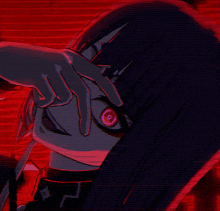 a close up of a person 's eye with a red eye
