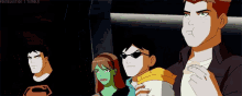 a group of young justice characters standing in a line