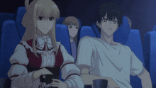 a girl is holding a cup that says popcorn