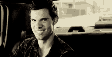 taylor lautner smiling yeah right