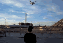 Drone Watching From Afar GIF - Drone Watching From Afar Drone Aircraft GIFs