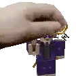 a pixel art of a hand holding a toy in a suit and tie .