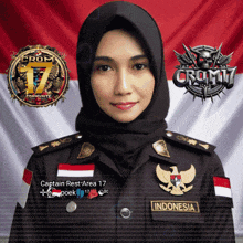 a woman wearing a black hijab and a military uniform with indonesia written on her badge