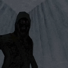 a silhouette of a person in a hood standing in front of a waterfall in a cave .