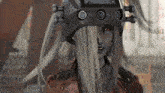 a computer generated image of a woman wearing a helmet with a camera on it .