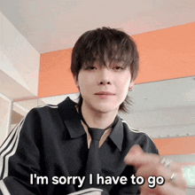 a man says i 'm sorry i have to go in front of a mirror