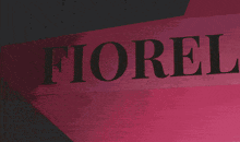 a picture of a woman with a pink background