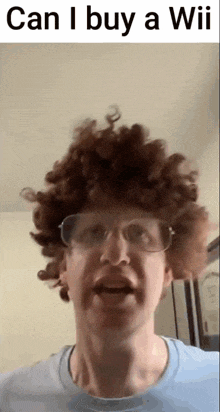 a man wearing glasses and a wig is talking about buying a wii