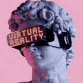 a statue wearing a virtual reality headset with virtual reality written on it