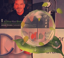 a picture of doug crowe is behind a bubble that says author your brand on it