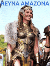 a poster for reyna amazona shows a woman in a warrior costume