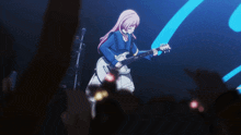 a girl playing a guitar in front of a microphone that says hartke