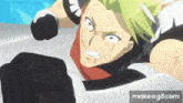 a man with green hair and black gloves is fighting another man in a video game .