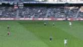 a soccer game is being played with the score 42 carl
