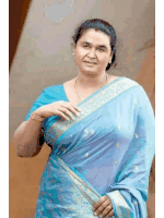 a woman wearing a blue and gold colored saree