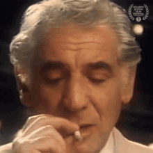 Smoking Leonard Bernstein GIF - Smoking Leonard Bernstein Bernsteins Wall GIFs