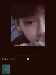 a video of a boy with the words con tim then on the bottom right