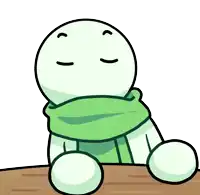 a cartoon character wearing a green scarf and sitting on a table