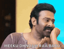 a man with a mustache is making a funny face with the words meeku dhndam raa babu below him
