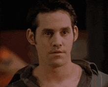 a man says " can i come " in front of his face