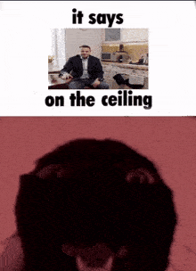 a man in a suit sits at a table in a kitchen with the words it says on the ceiling below him