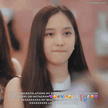 a woman with long hair is making a funny face and congratulating her followers on instagram
