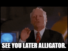 a man in a suit and tie says `` see you later alligator . ''