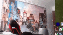 a wall with a picture of a town and a sign that says ' cafe ' on it