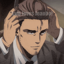 a man in a suit combs his hair with the words kuro loves jeanbo