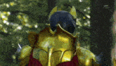 a close up of a knight 's back with a tv asahi logo in the corner