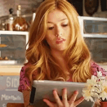Katherine Mc Namara Reading GIF - Katherine Mc Namara Reading Tablet GIFs