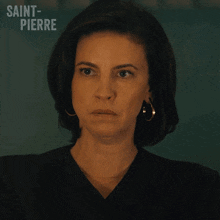 a woman says it 's classy in front of a saint pierre logo