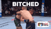 two men are fighting in a boxing ring with the words " bitches " on the bottom