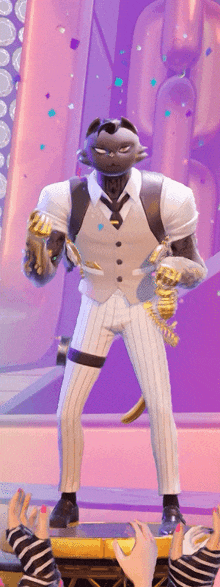 a man in a suit and tie holds a trophy in his hand