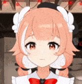 a close up of a girl 's face with a red bow