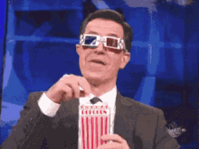 Stephen Colbert Eating Popcorn GIF
