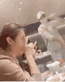 Drinking Waiter GIF - Drinking Waiter Stretching Noodles GIFs