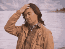 Neil Oliver Serious GIF - Neil Oliver Serious Fix Hair GIFs