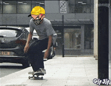 a man wearing a mask and a yellow hat is riding a skateboard in front of a thrasher sign