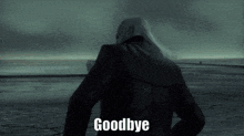 a man in a black leather jacket says goodbye