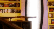 a shelf full of cd 's including one that says ' i love you '