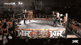 a wrestling ring with wr super show written on the side