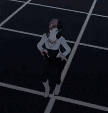 a woman with red hair is standing on a black tile floor