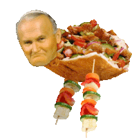 a sandwich with a man 's face on it and vegetables on sticks
